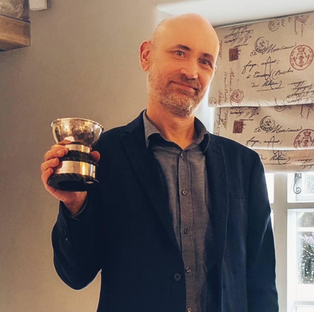 Alex Frost with Llangorse Sailing Club's Griffin Trophy